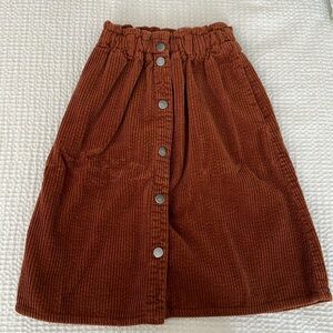 Zara kids corduroy midi skirt with snaps & pockets and cinch waist. Rust/brown.